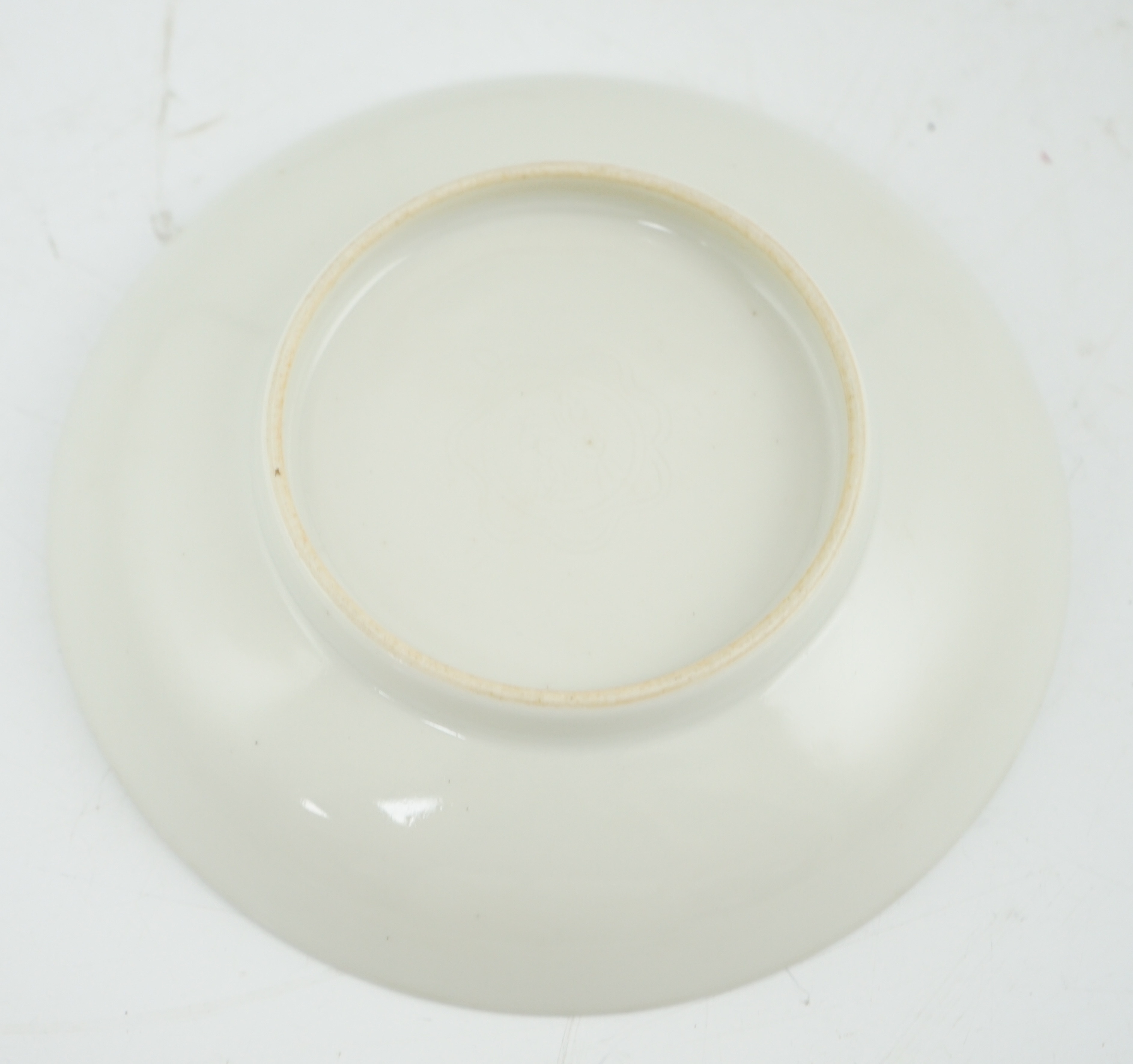 A Chinese moulded white glazed saucer dish, Yongle mark, Republic period
